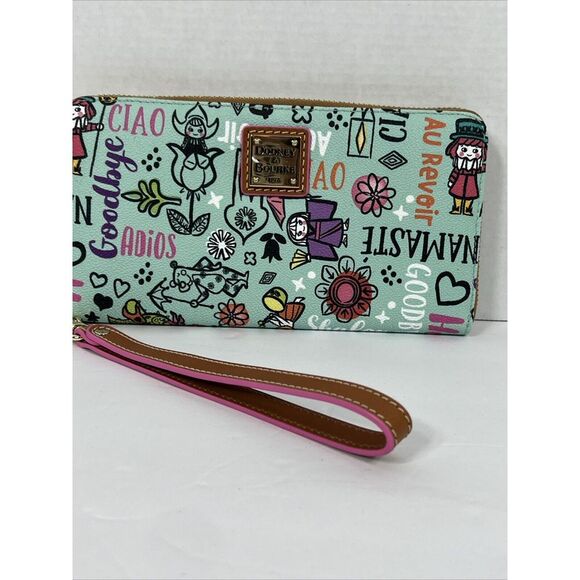 Dooney & Bourke Handbags - Dooney & Bourke Disney Parks It's A Small World Wristlet Wallet